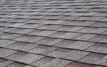 Detchant tiles for shallow pitch roofing